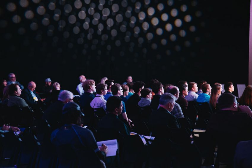 Conferences - crowd of people sitting on chairs inside room