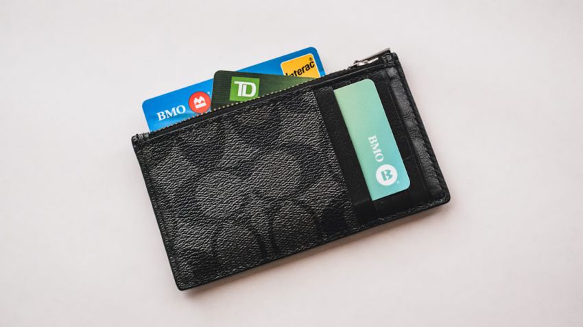 Mortgage Interest - a wallet with credit cards sticking out of it